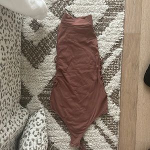Mauve turtle neck body suit